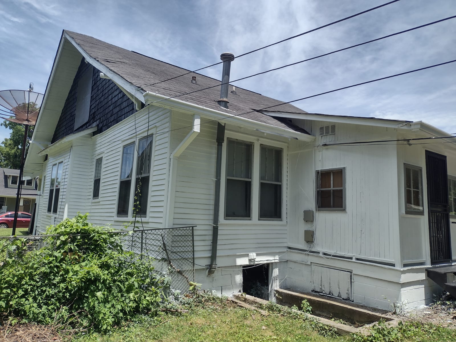 After — house front view freshly painted
